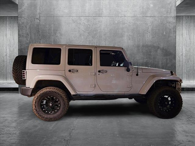 used 2015 Jeep Wrangler Unlimited car, priced at $19,042