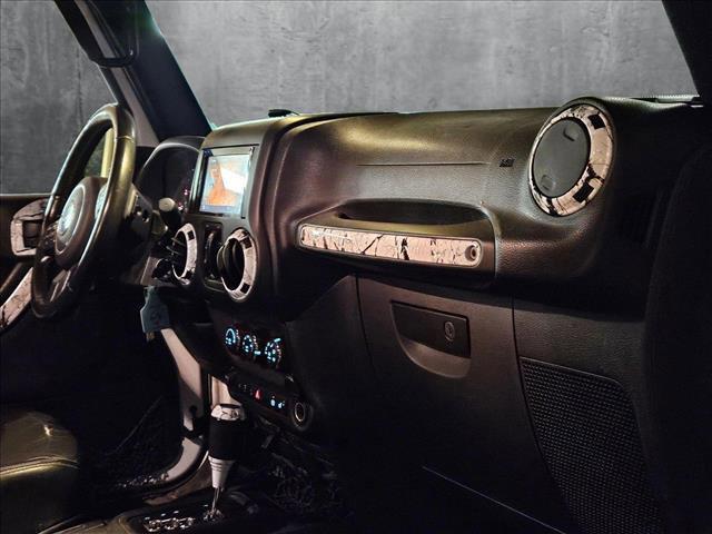 used 2015 Jeep Wrangler Unlimited car, priced at $19,042