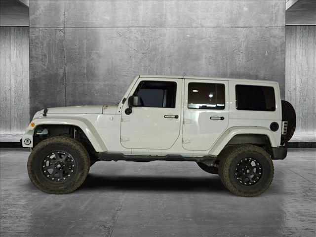 used 2015 Jeep Wrangler Unlimited car, priced at $19,042