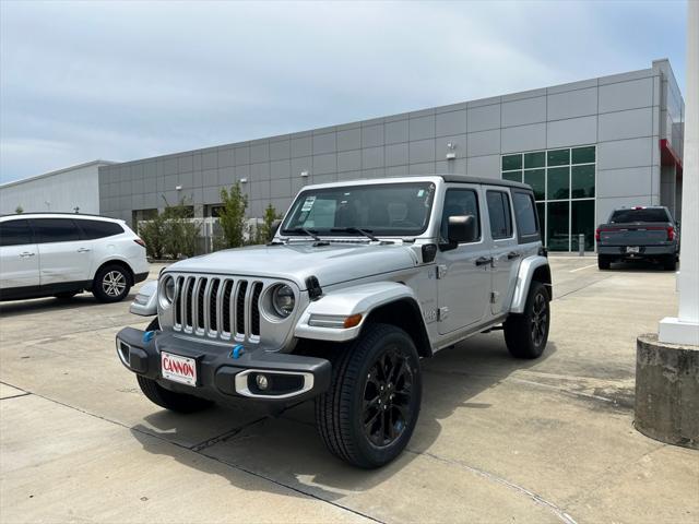 used 2023 Jeep Wrangler 4xe car, priced at $33,752