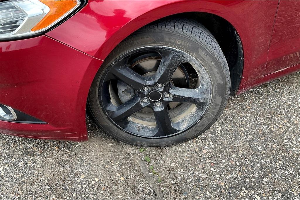 used 2015 Ford Fusion car, priced at $4,000
