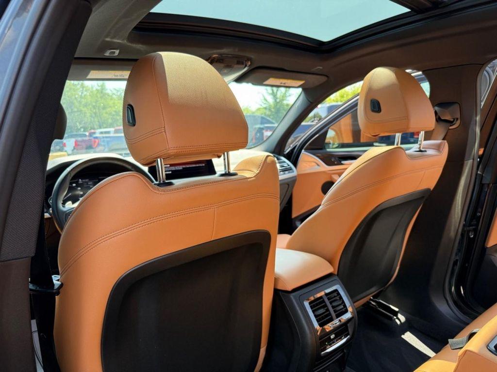 used 2022 BMW X4 car, priced at $37,588