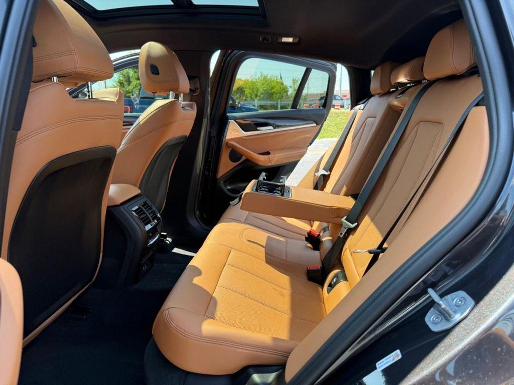 used 2022 BMW X4 car, priced at $37,588