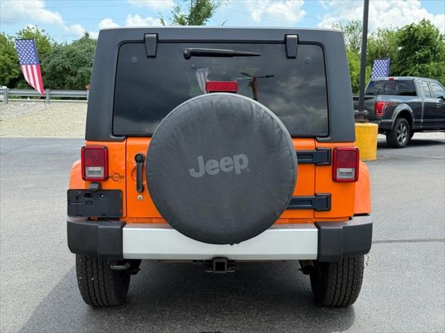 used 2012 Jeep Wrangler Unlimited car, priced at $9,495