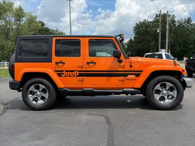 used 2012 Jeep Wrangler Unlimited car, priced at $9,495