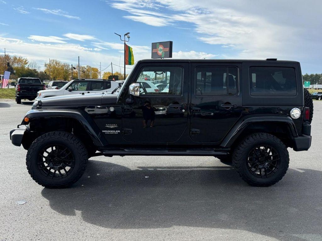 used 2011 Jeep Wrangler Unlimited car, priced at $14,880