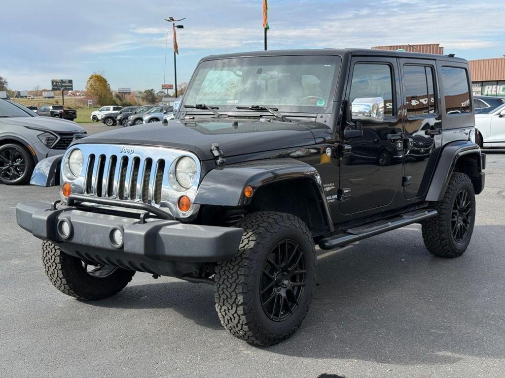 used 2011 Jeep Wrangler Unlimited car, priced at $14,880