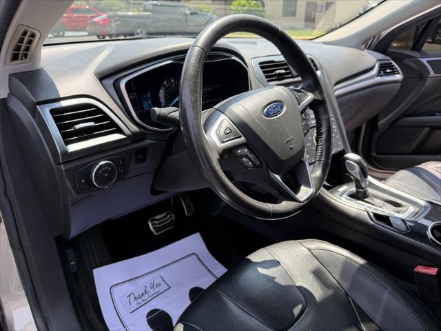 used 2015 Ford Fusion car, priced at $11,895