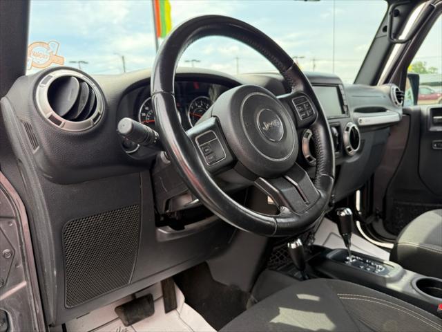 used 2016 Jeep Wrangler Unlimited car, priced at $21,455
