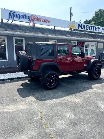 used 2013 Jeep Wrangler Unlimited car, priced at $14,949