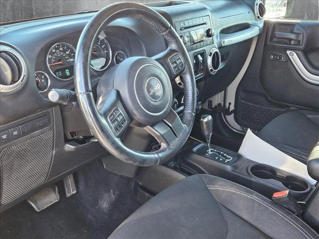 used 2016 Jeep Wrangler Unlimited car, priced at $23,124