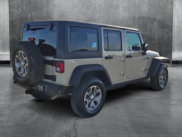 used 2016 Jeep Wrangler Unlimited car, priced at $23,124