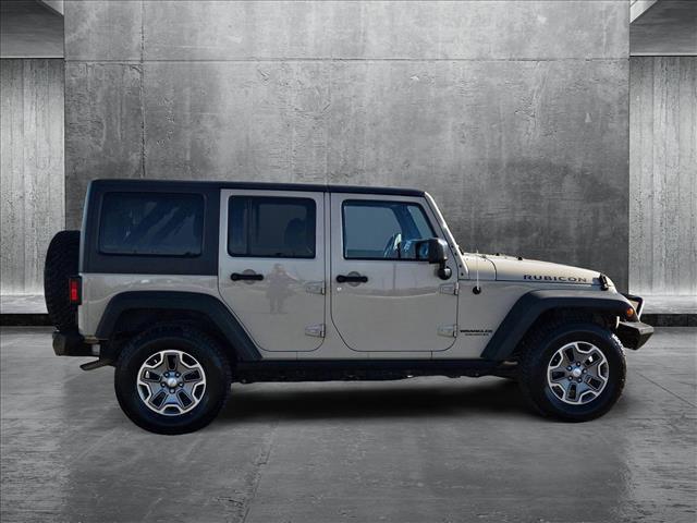 used 2016 Jeep Wrangler Unlimited car, priced at $23,124