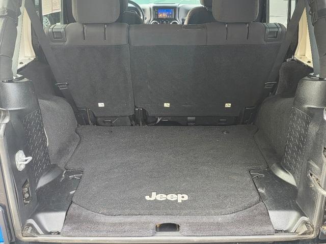 used 2014 Jeep Wrangler Unlimited car, priced at $12,995