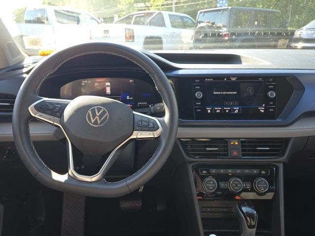 used 2024 Volkswagen Taos car, priced at $26,750