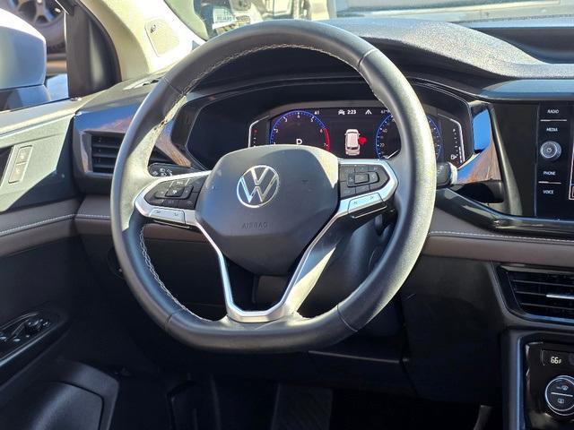 used 2022 Volkswagen Taos car, priced at $19,295