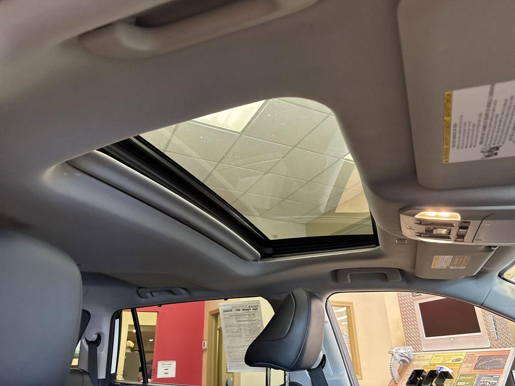 used 2022 Toyota Highlander Hybrid car, priced at $39,555