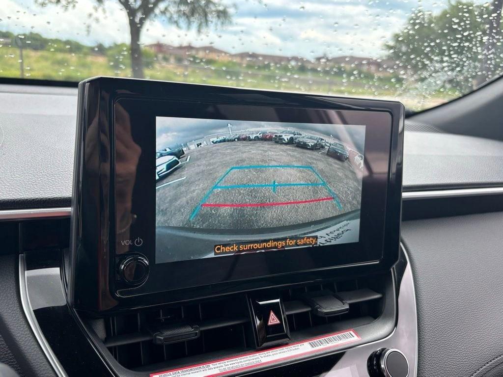 used 2023 Toyota Corolla Cross Hybrid car, priced at $30,972