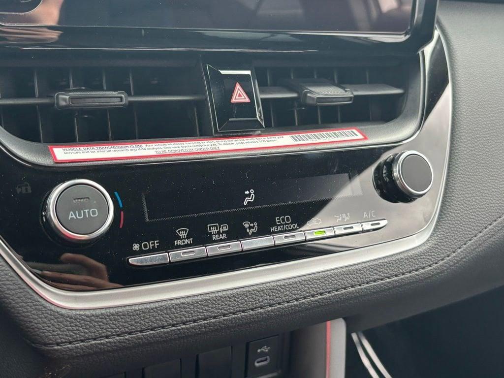 used 2023 Toyota Corolla Cross Hybrid car, priced at $30,972