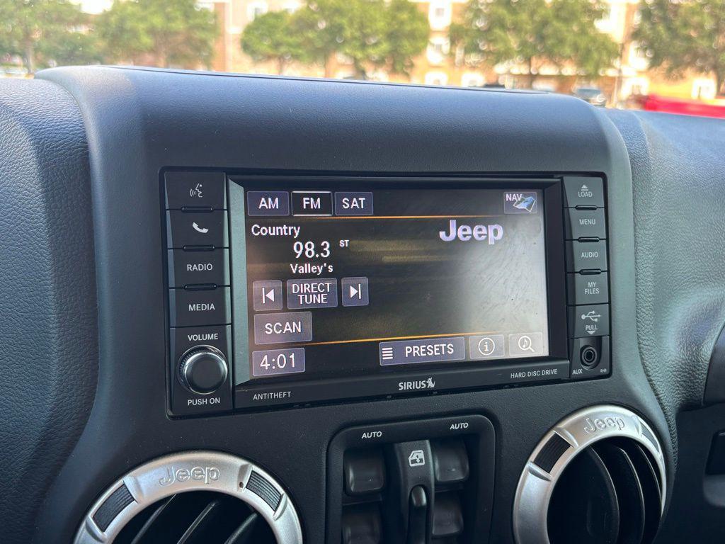 used 2018 Jeep Wrangler JK Unlimited car, priced at $26,591