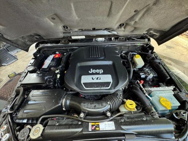 used 2014 Jeep Wrangler Unlimited car, priced at $18,995