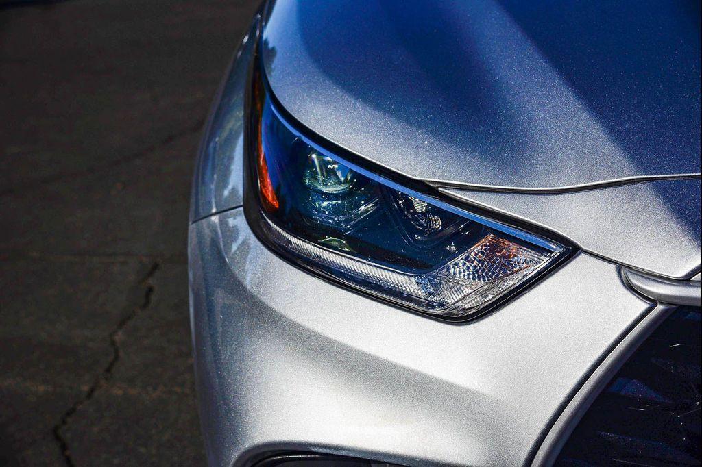 used 2021 Toyota Highlander Hybrid car, priced at $30,741