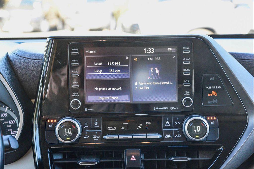 used 2021 Toyota Highlander Hybrid car, priced at $30,741