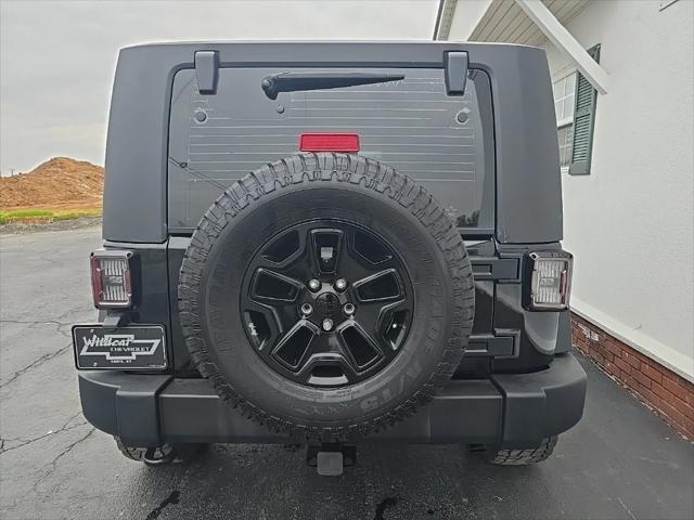 used 2014 Jeep Wrangler car, priced at $14,749