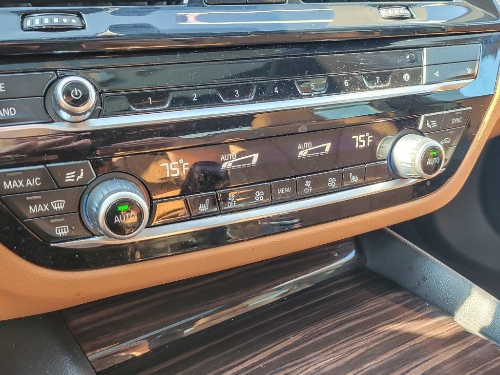 used 2023 BMW 530e car, priced at $34,999
