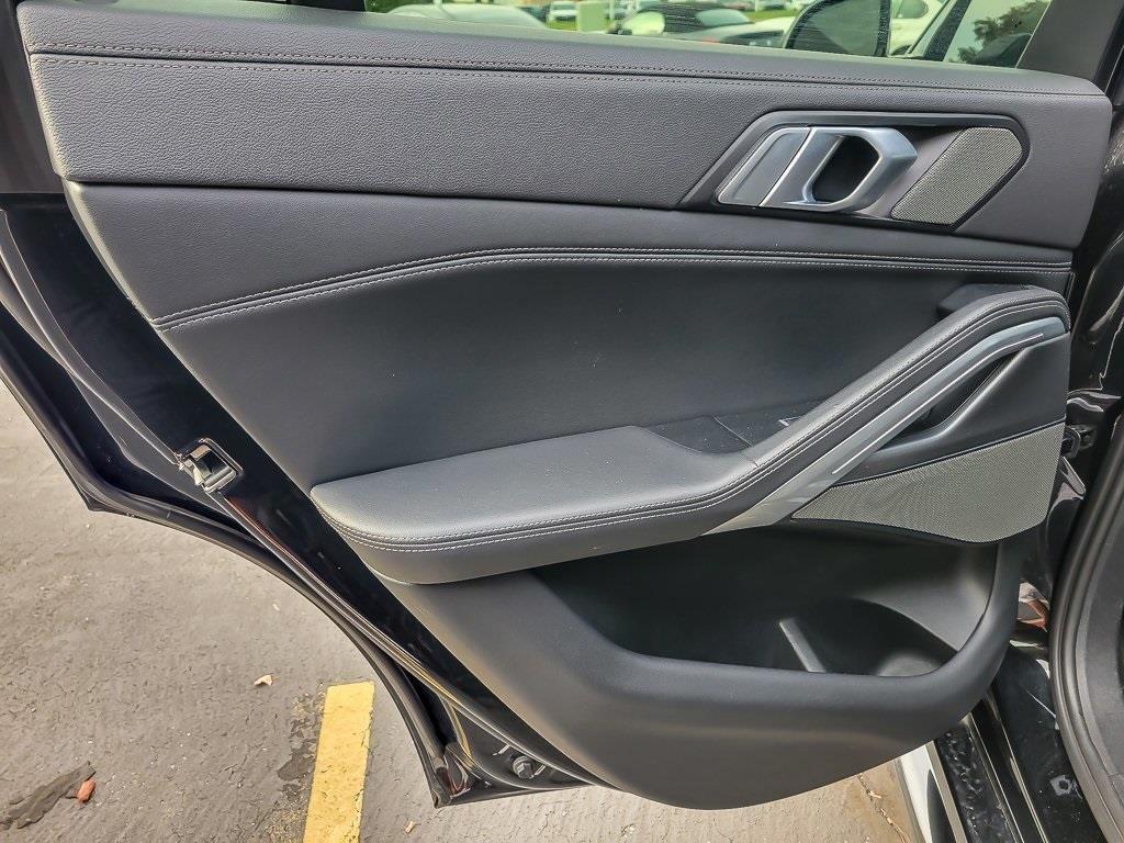 used 2023 BMW X6 car, priced at $52,998