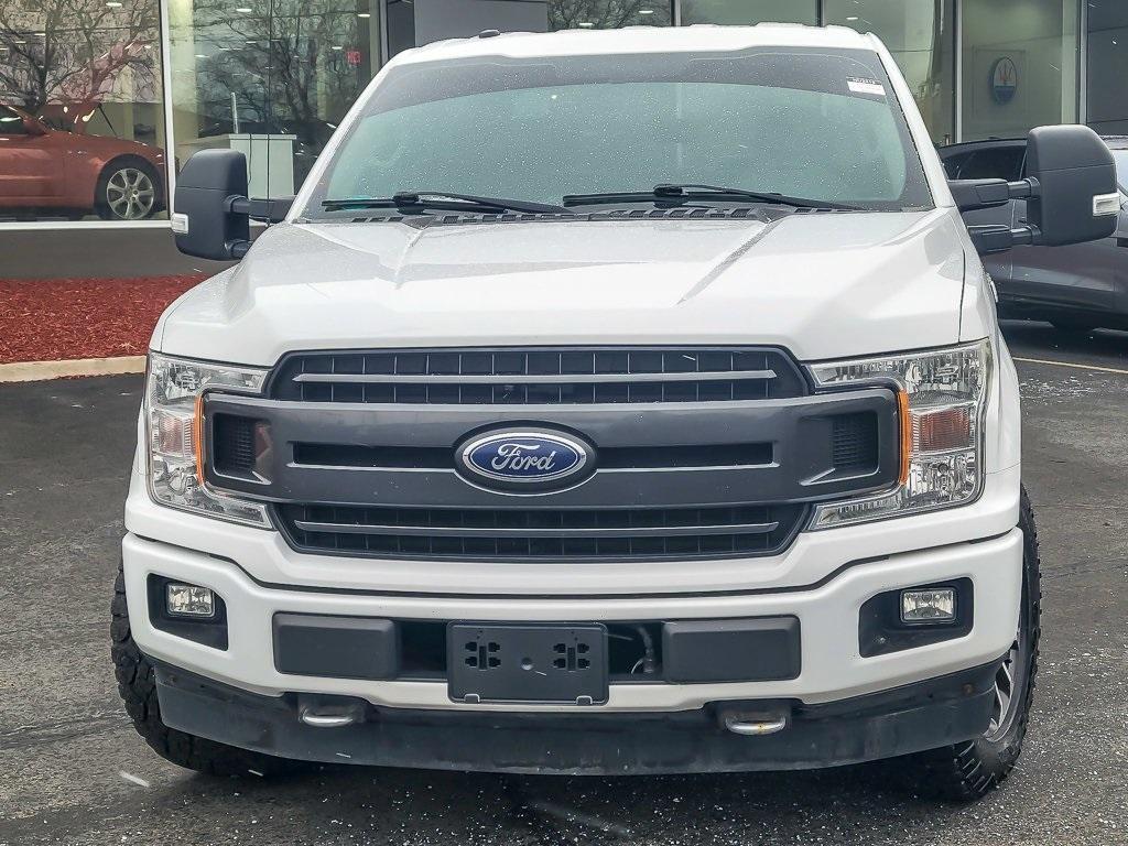 used 2018 Ford F-150 car, priced at $26,489