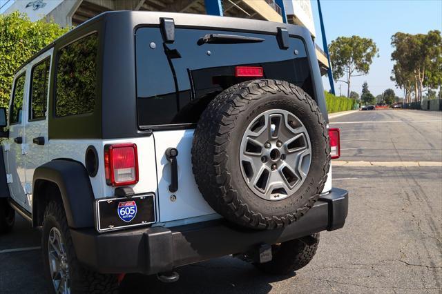 used 2015 Jeep Wrangler Unlimited car, priced at $17,389