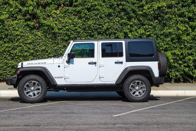 used 2015 Jeep Wrangler Unlimited car, priced at $17,389