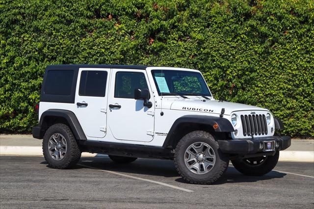 used 2015 Jeep Wrangler Unlimited car, priced at $17,389