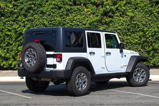 used 2015 Jeep Wrangler Unlimited car, priced at $17,389