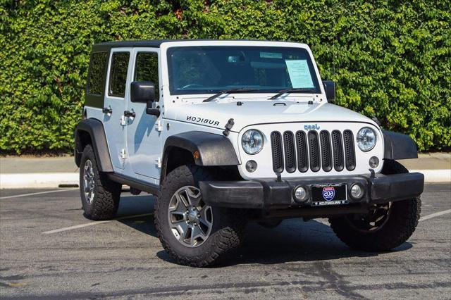 used 2015 Jeep Wrangler Unlimited car, priced at $17,389