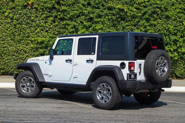 used 2015 Jeep Wrangler Unlimited car, priced at $17,389