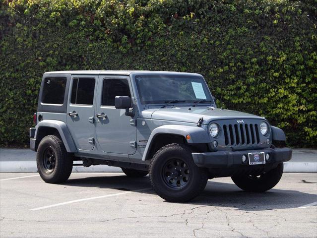 used 2014 Jeep Wrangler Unlimited car, priced at $15,276