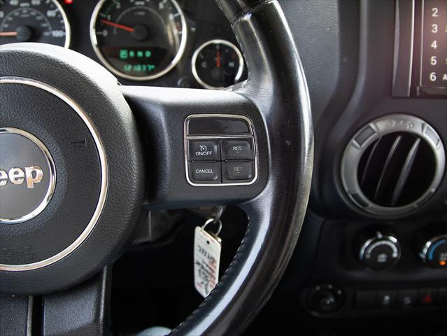 used 2014 Jeep Wrangler Unlimited car, priced at $15,276