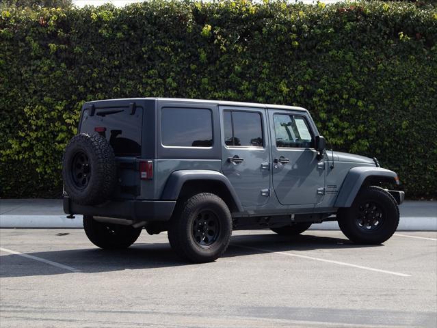 used 2014 Jeep Wrangler Unlimited car, priced at $15,276