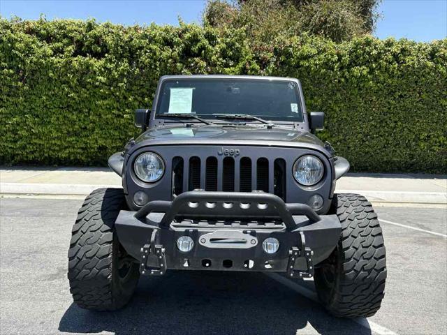 used 2016 Jeep Wrangler Unlimited car, priced at $23,538