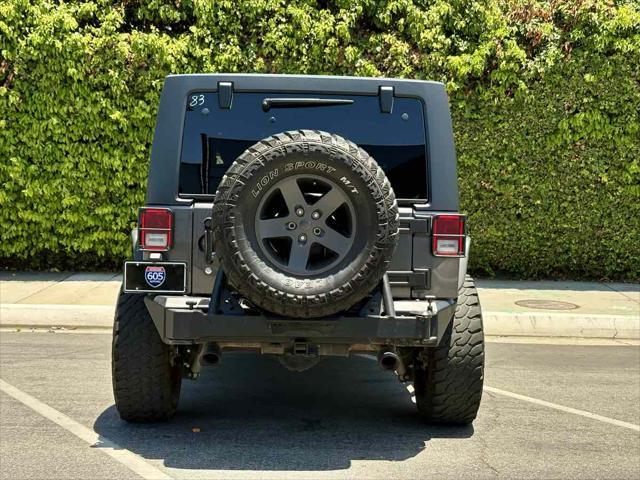 used 2016 Jeep Wrangler Unlimited car, priced at $23,538