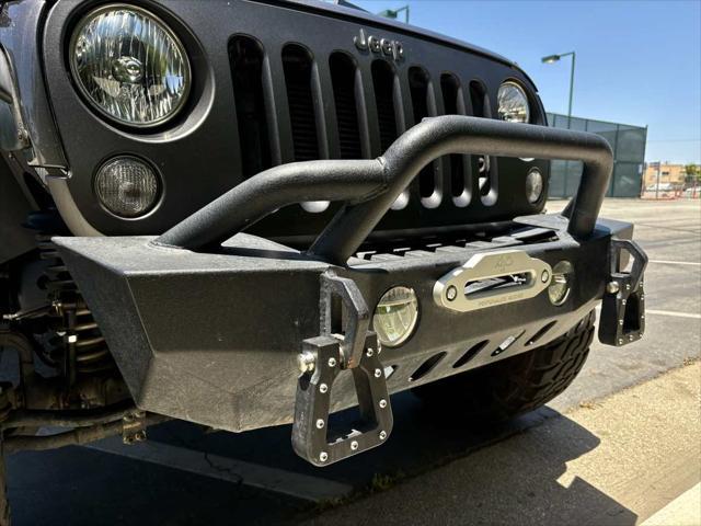 used 2016 Jeep Wrangler Unlimited car, priced at $23,538
