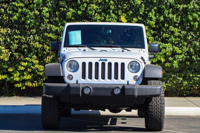 used 2015 Jeep Wrangler Unlimited car, priced at $17,439