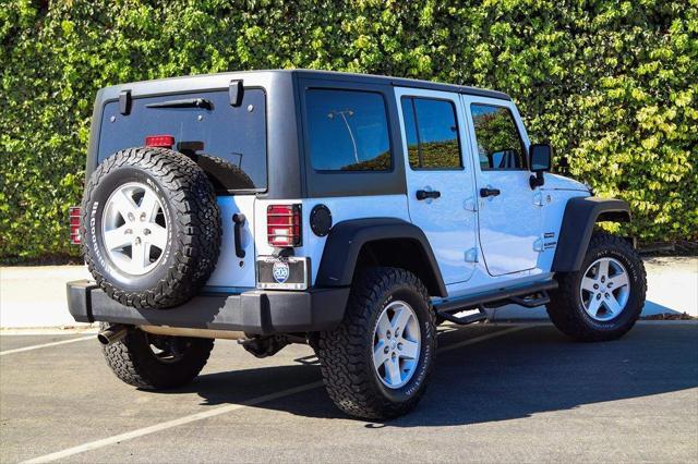 used 2015 Jeep Wrangler Unlimited car, priced at $17,439