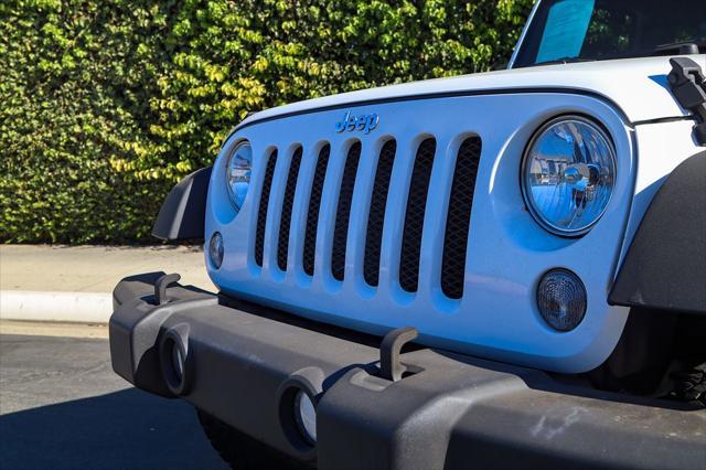 used 2015 Jeep Wrangler Unlimited car, priced at $17,439