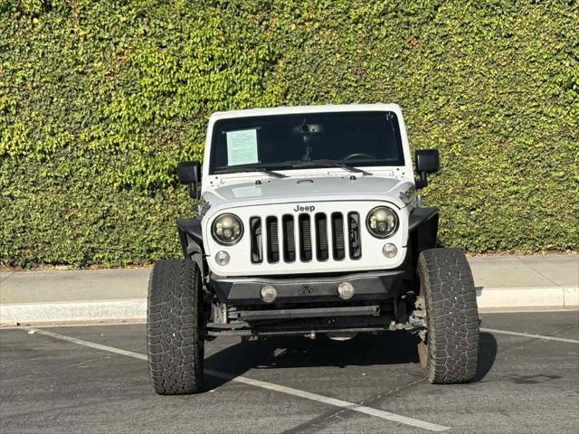 used 2016 Jeep Wrangler Unlimited car, priced at $21,428