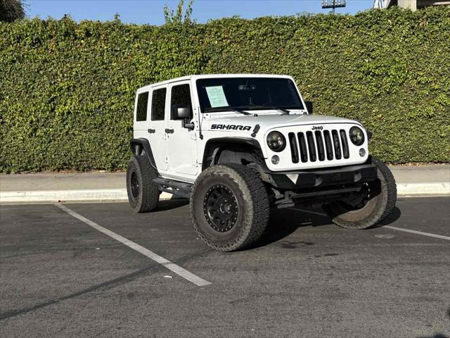 used 2016 Jeep Wrangler Unlimited car, priced at $21,428