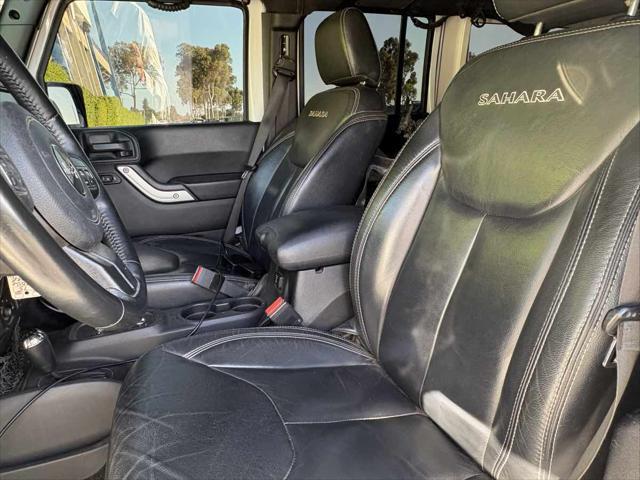 used 2016 Jeep Wrangler Unlimited car, priced at $21,428