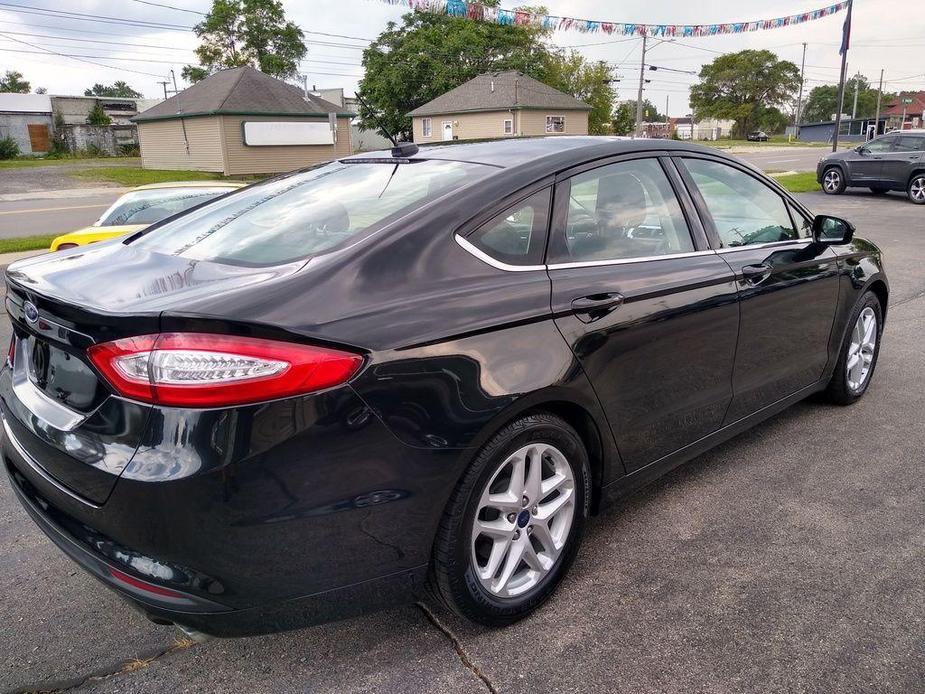 used 2014 Ford Fusion car, priced at $7,850